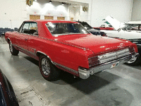Image 3 of 8 of a 1965 OLDSMOBILE CUTLASS