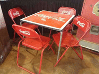 Image 1 of 1 of a N/A COCA COLA TABLE WITH 4 CHAIRS
