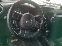 Image 6 of 8 of a 2011 JEEP WRANGLER UNLIMITED SAHARA