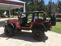 Image 2 of 12 of a 1998 JEEP WRANGLER SPORT