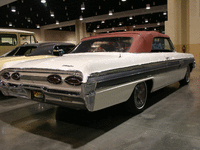 Image 11 of 12 of a 1962 OLDSMOBILE STARFIRE