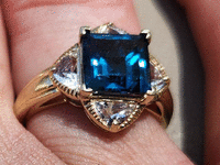 Image 1 of 1 of a N/A RING BLUE SAPPHIRE & CLEAR GEMSTONES