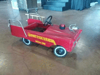 Image 1 of 3 of a N/A FIREFIGHTER PEDAL CAR BLACK SEAT AND BELL