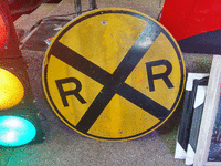 Image 1 of 1 of a N/A ROUND RAILROAD CROSSING SIGN