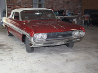 Image 2 of 6 of a 1961 OLDSMOBILE STARFIRE