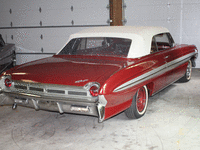 Image 5 of 6 of a 1961 OLDSMOBILE STARFIRE