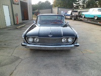 Image 12 of 16 of a 1960 FORD STARLINER