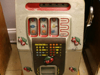 Image 1 of 1 of a N/A GENUINE MILLS 5 CENT SLOT MACHINE