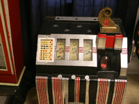 Image 2 of 3 of a N/A GENIUNE MILLS 5 CENT SLOT MACHINE