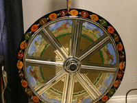 Image 1 of 2 of a N/A ANTIQUE SPIN WHEEL N/A