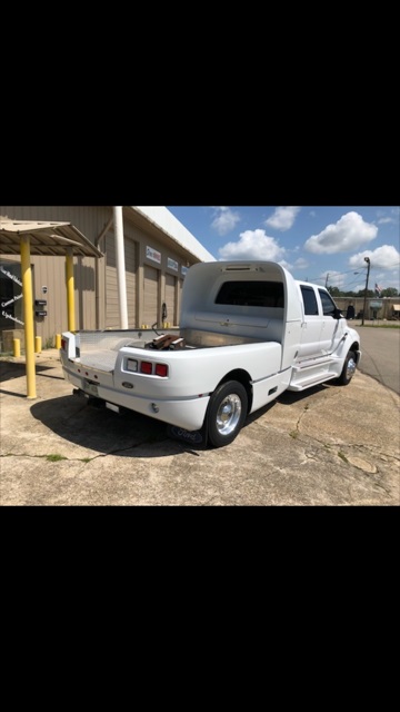 3rd Image of a 2003 FORD F650 SUPER CREWZER F SUPER DUTY