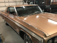 Image 1 of 6 of a 1964 OLDSMOBILE STARFIRE