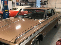 Image 2 of 6 of a 1964 OLDSMOBILE STARFIRE