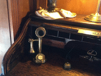 Image 2 of 2 of a 1910 CANDLESTICK ROTARY PHONE