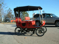 Image 2 of 3 of a 1901 OLDSMOBILE CURVED DASH REPLICA