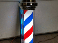 Image 1 of 1 of a N/A BARBER POLE LIGHTS AND SPINS