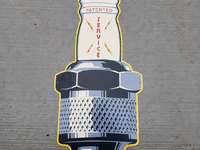 Image 1 of 1 of a N/A CHAMPION SPARK PLUG SIGN