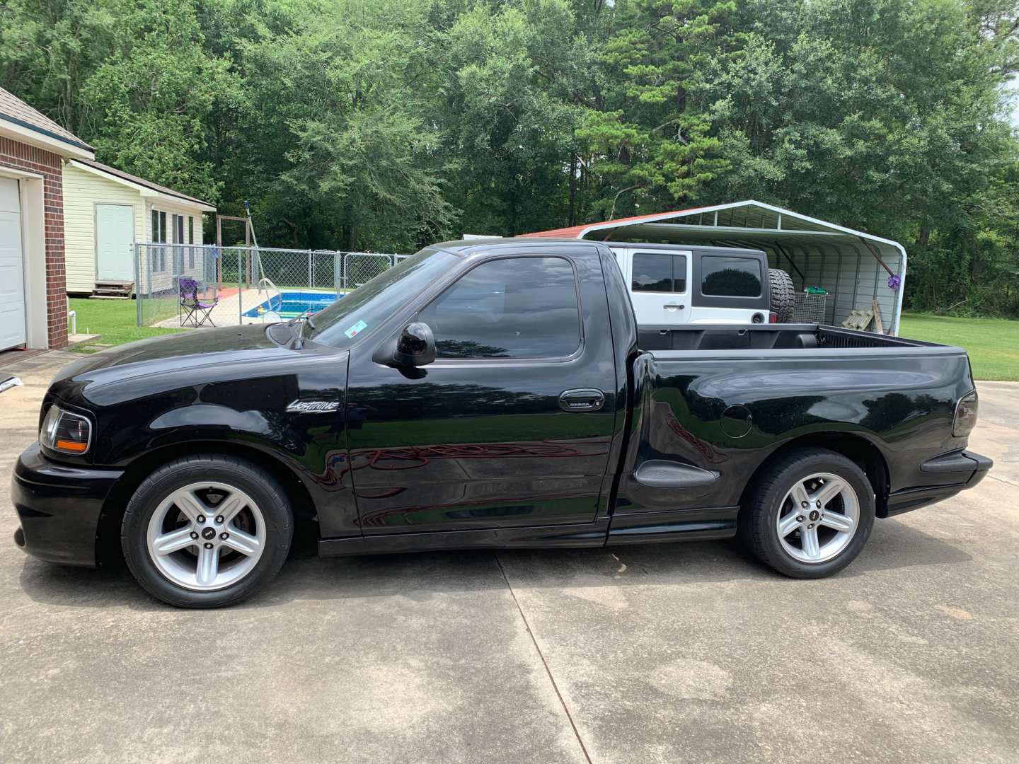 3rd Image of a 2004 FORD LIGHTENING F-150 HERITAGE