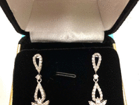 Image 1 of 1 of a N/A DANGLE EARRINGS DIAMOND AND TANZANITE