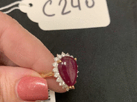 Image 2 of 2 of a N/A RING RUBY 7 DIAMOND