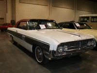 Image 2 of 12 of a 1962 OLDSMOBILE STARFIRE