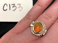 Image 1 of 2 of a N/A 14K RING DIAMOND AND OPAL