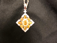 Image 2 of 2 of a N/A 14K GOLD PENDANT YELLOW AND WHITE GOLD