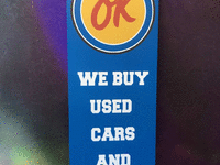 Image 1 of 1 of a N/A OK USED CARS VINTAGE SIGN