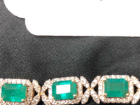 Image 2 of 2 of a N/A EMERALD AND DIAMOND GOLD BRACELET