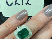 Image 1 of 2 of a N/A DIAMOND RING EMERALD