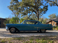 Image 7 of 13 of a 1957 CADILLAC DEVILLE