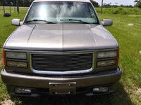 Image 1 of 18 of a 1999 GMC SUBURBAN K2500