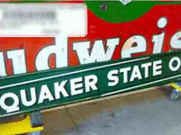 Image 1 of 1 of a N/A QUAKER STATE OIL METAL SIGN