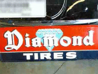 Image 1 of 1 of a N/A DIAMOND TIRES METAL SIGN