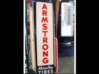 Image 1 of 1 of a N/A RHINO FLEX TIRES METAL SIGN