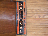 Image 1 of 1 of a N/A NATIONAL BATTERY METAL SIGN