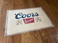 Image 1 of 2 of a N/A COORS BANQUET STAMPED METAL SIGN