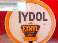 Image 1 of 1 of a N/A TYDOL ROUND METAL SIGN