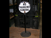 Image 1 of 1 of a N/A NO PARKING FUNERAL SIGN ON STAND