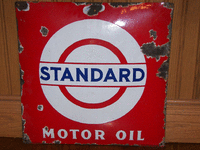 Image 1 of 1 of a N/A STANDARD MOTOR OIL METAL SIGN