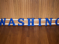 Image 1 of 1 of a N/A WASHING SIGN BLUE LETTER
