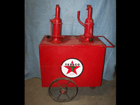 Image 1 of 1 of a N/A TEXACO OIL CONTAINER 2 PUMPS ON WHEELS