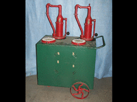 Image 1 of 1 of a N/A SINCLAIR OIL PUMP CONTAINER ON WHEELS