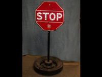 Image 1 of 1 of a N/A STOP SIGN ON WHEELS