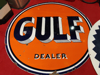 Image 1 of 1 of a N/A GULF DEALER METAL SIGN LG ROUND
