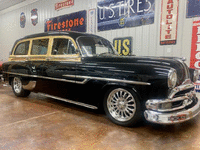 Image 3 of 17 of a 1953 PONTIAC TIN WOODY