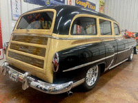 Image 4 of 17 of a 1953 PONTIAC TIN WOODY