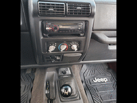 Image 13 of 18 of a 1999 JEEP WRANGLER SPORT