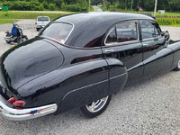 Image 7 of 16 of a 1946 BUICK 144