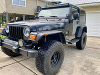 Image 2 of 11 of a 2004 JEEP WRANGLER SAHARA